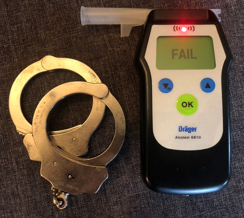 20181216 impaired driving w cuffs and tester