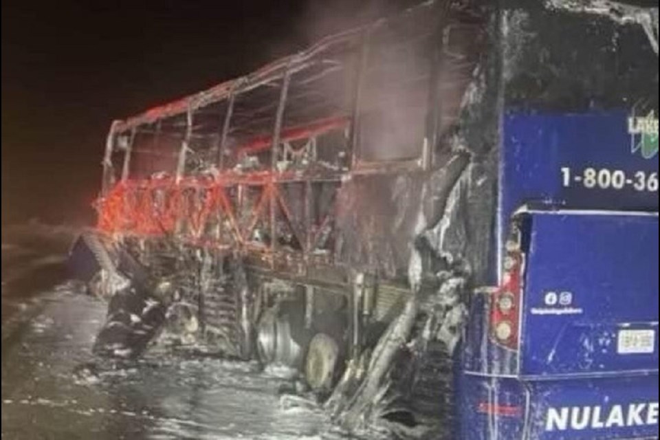 The Tisdale Bus Lines coach was heavily damaged by the fire Sunday evening on Highway 11 near the West Sesekinika Lake Road turnoff.