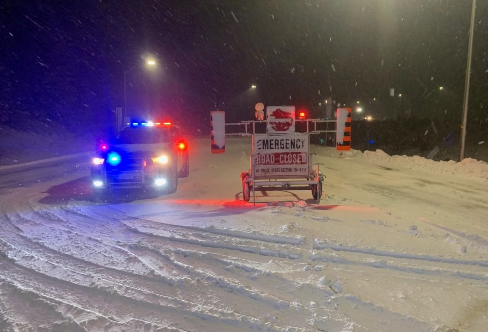 20220102 road closed sign winter with opp cruiser turl