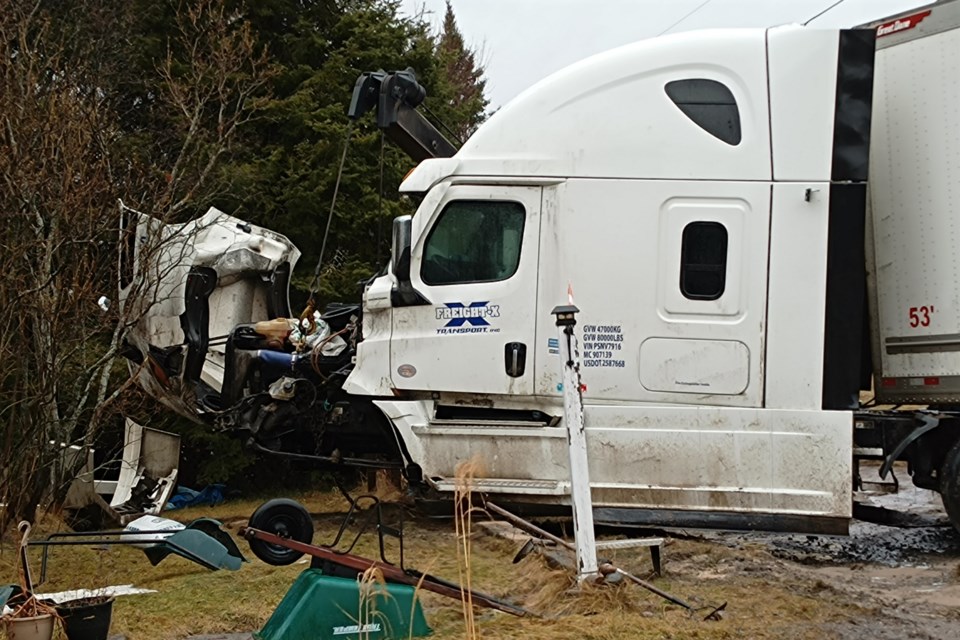This transport crashed through a guardrail and landed in Jack Doherty's front yard.