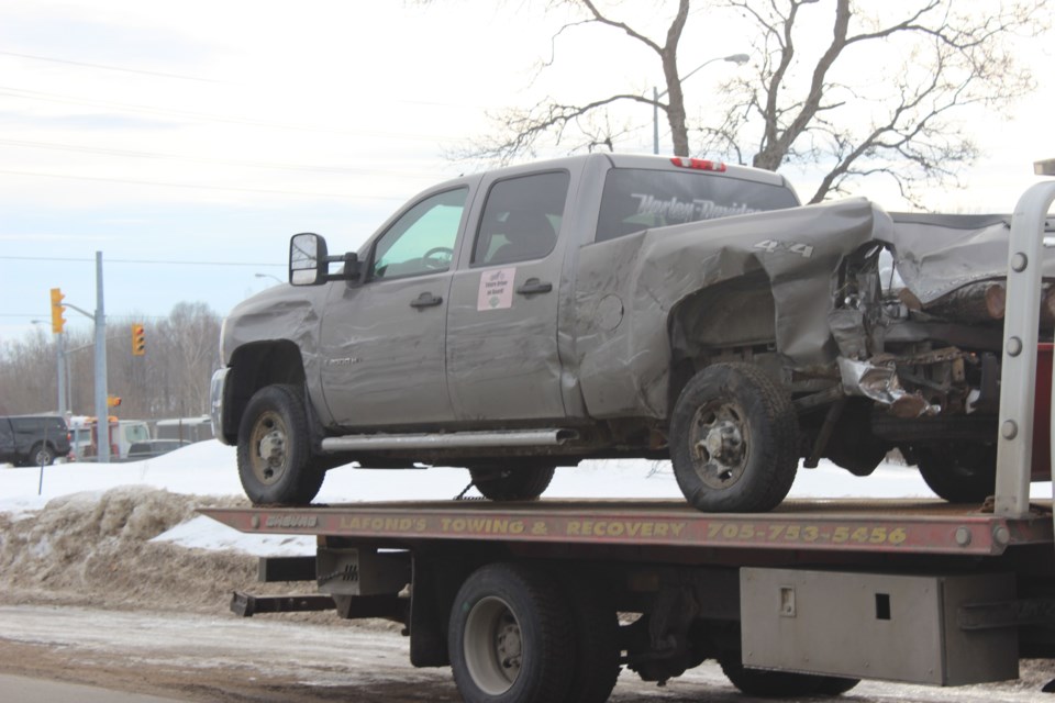 Damaged pickup on the back of a flatbed this morning.  Photo by Ryen Veldhuis. 