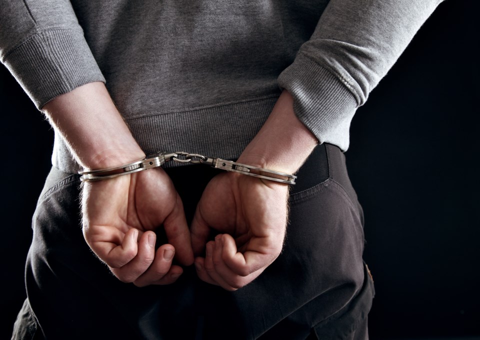 arrested handcuffs shutterstock_126526751 2016