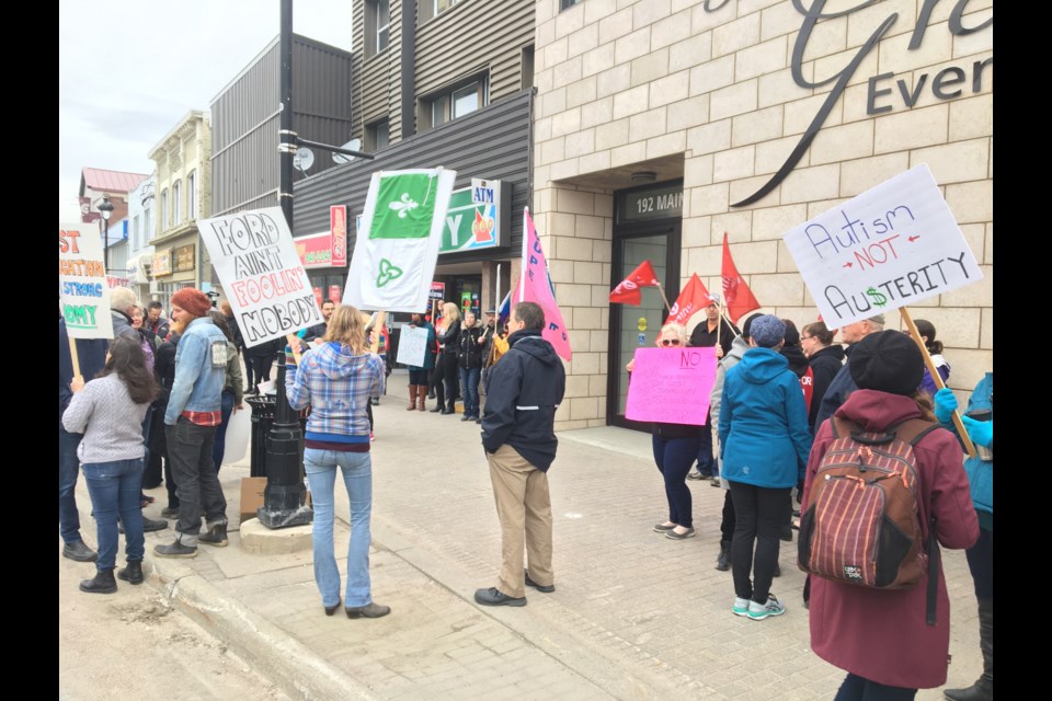 Protesters gather outside the Grande Event Centre on Main St. Chris Dawson/BayToday.