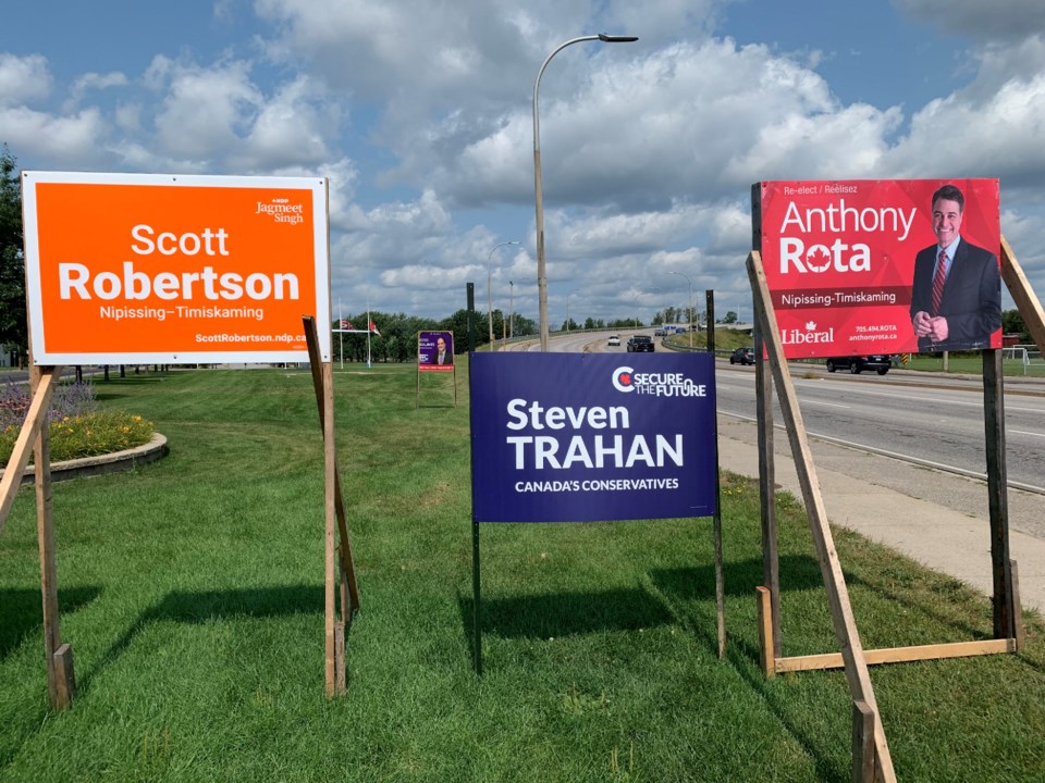 20210826 federal election signs