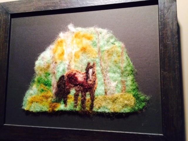 This framed artwork is made of dyed wool. Photos by Jeff Turl. See our gallery at top right.