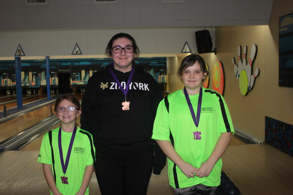 Partners medallists left to right: Sadie Tremblay, Kyrsten Tremblay, Leah Spurvey. Submitted.
