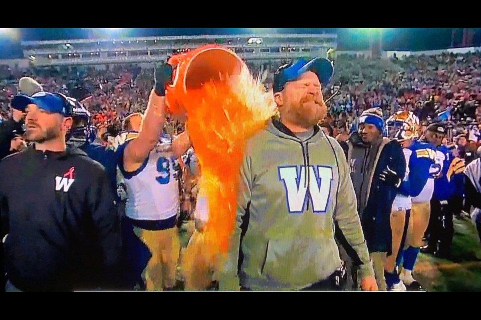 Winnipeg head coach and North Bay native Mike O'Shea gets a Gatorade shower from his players for winning the Grey Cup.  Courtesy TSN.