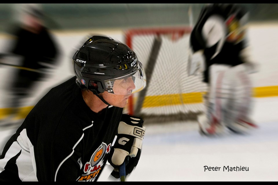 Wooden-Sticks Hockey Club  Peter Mathieu