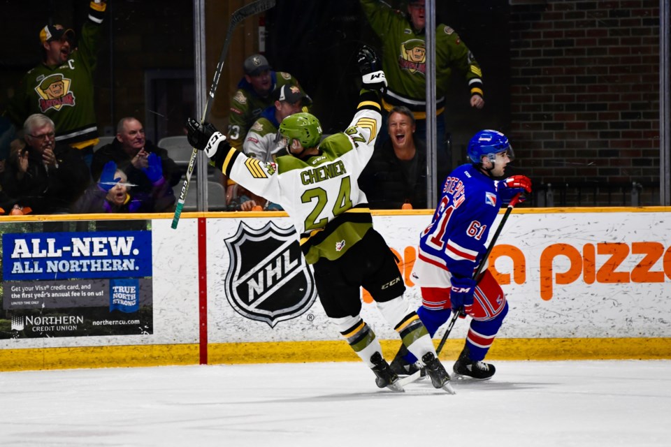 Celebration! Bradley Chenier celebrates one of his two goals in a Battalion offensive outburst. 
 Photo by Tom Martineau/BayToday.ca