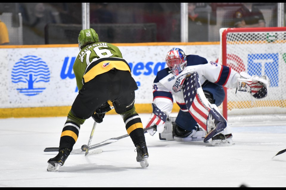 Kyle Jackson with a chance in front of Spirit goaltender Tristan Lennox.  Photo by Tom Martineau/BayToday