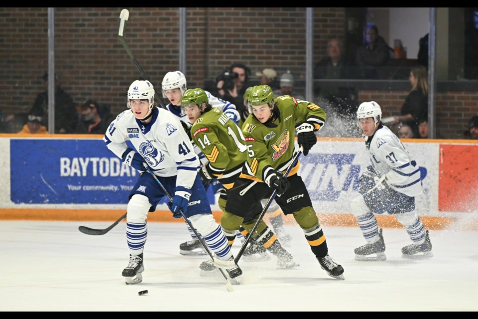 Anthony Romani battles for the puck. Photo by Tom Martineau/BayToday.