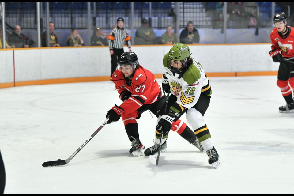 Carter Kostuch on an Attack player. Photo by Tom Martineau/BayToday.  