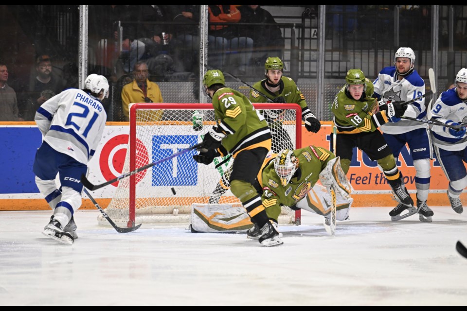 Battalion goaltender Mike McIvor makes the save on this Alex Pharand chance in the first period.
