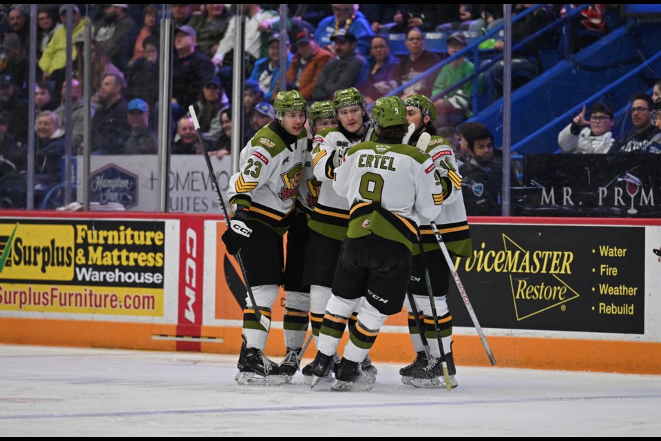 The Battalion celebrate Dalyn Wakely's power play goal in the first period.