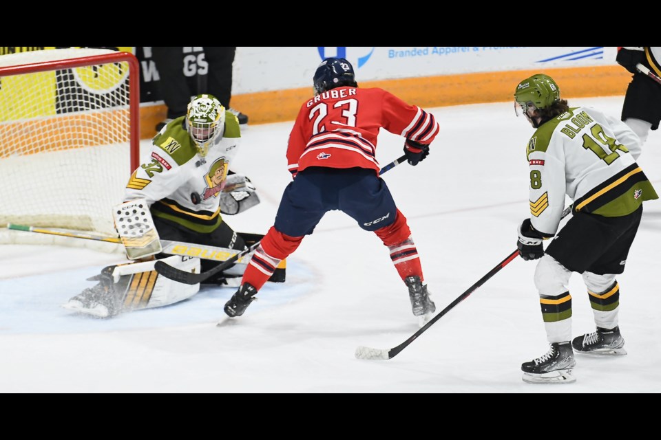 Battalion goaltender Charlie Robertson makes one of his 28 saves against Oshawa in a 3-0 Troops win. Photo by Sean Ryan. 