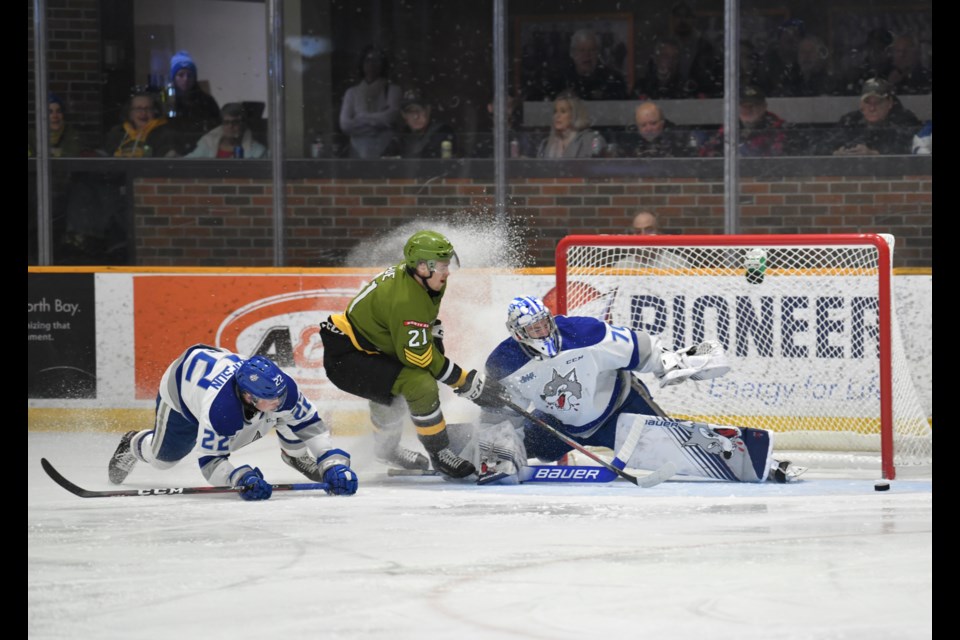 Brandon Coe misses the net on this first period drive.  Photo by Tom Martineau/BayToday