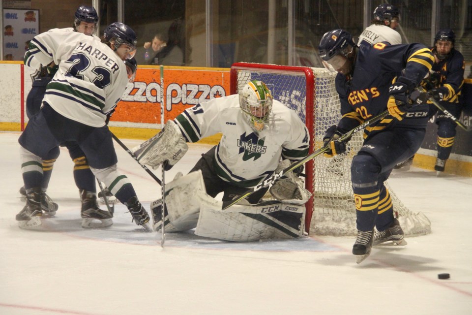 Save by Lakers goalie Brent Moran during first period action.  Photo by Chris Dawson. 