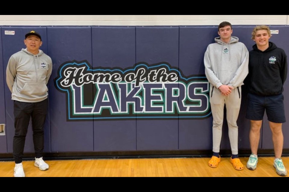 Lakers Mens Volleyball Head Coach Eric Yung (left) with local recruits Ben Franz and Jude Caruso (far right). Photo by Matt Sookram. 