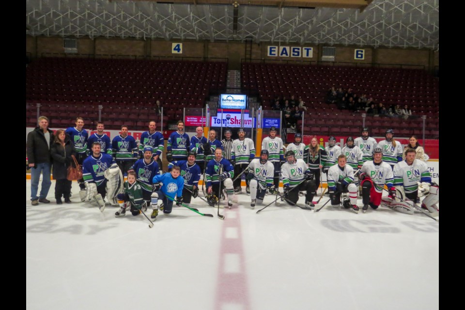 Group picture from the 2021-2022 Paul Nelson Memorial Game. Photo provided by Mark Bruner. 