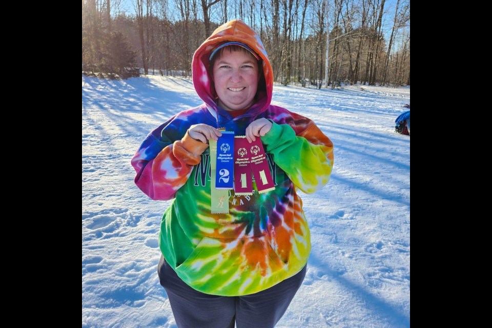 Snowshoeing competitor Jackelyn Osborne shows off her competition ribbons. Photo provided by Lisa O'Kane. 