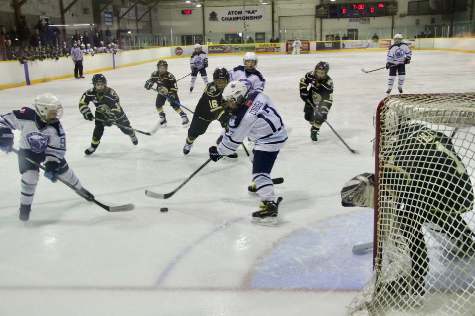 Action between Knights and Trappers Saturday afternoon.  Photo by Chris Dawson. 