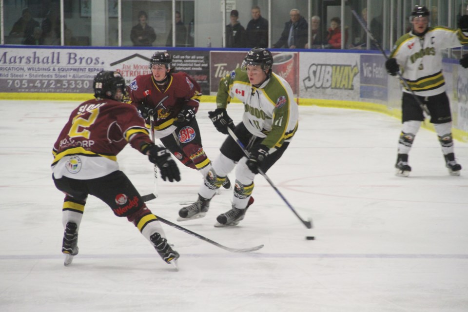 Voodoos forward Cade Herd rushes the puck.  Photo by Chris Dawson. 