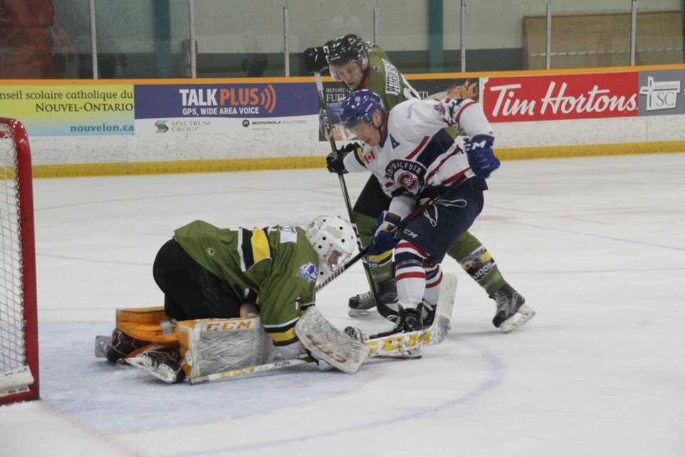 Battalion prospect Christian Cicigoi covers up a rebound during first period action.  Photo by Chris Dawson/BayToday.ca 