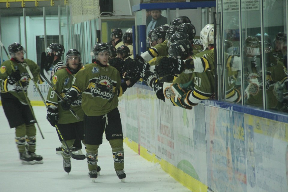 Tyler Gervais-Rolfe leads the celebration after his first period goal. The Voodoos beat the Beavers 6-0. Photo by Chris Dawson
