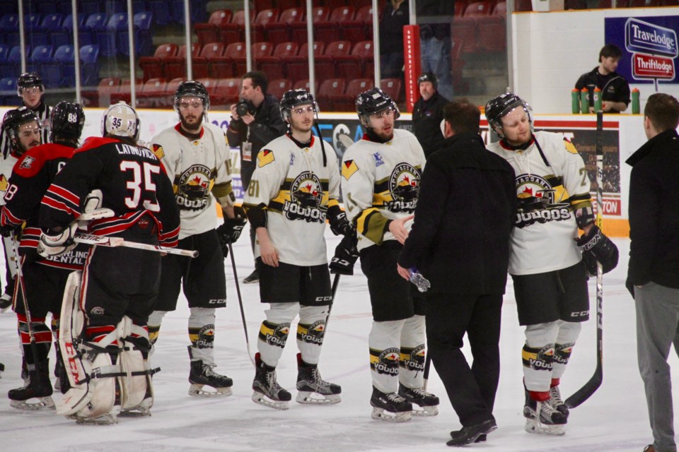 Voodoos shake hands after being eliminated by the Georgetown Raiders. Photo by Chris Dawson.