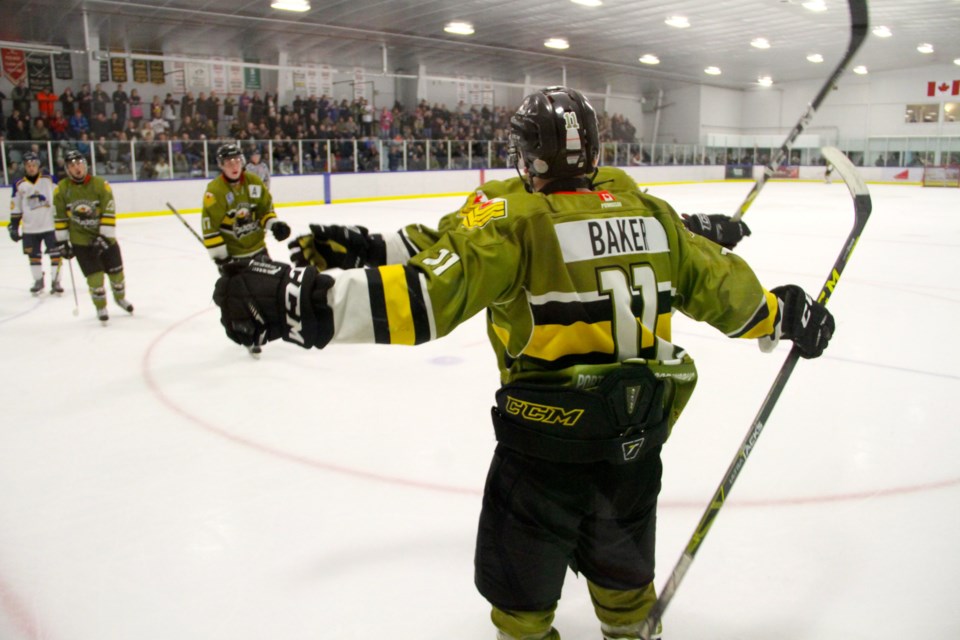 Andy Baker celebrates one of his two second period power play goals.  Photo by Chris Dawson. 