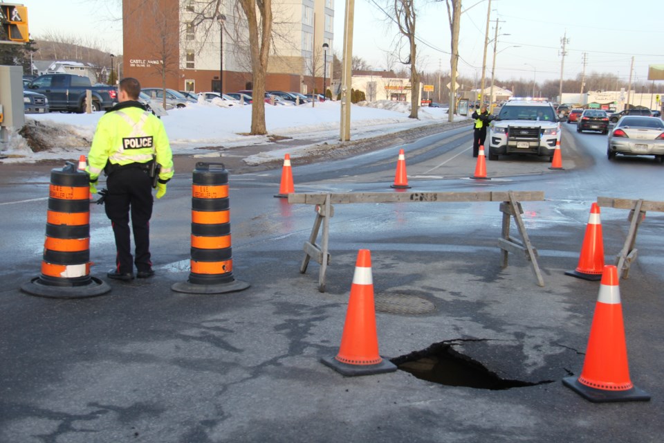 A sinkhole opened up on Cassells St. Saturday afternoon. Photo by Jeff Turl.