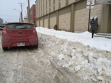 20200117 snow bank blocks parking meter rob morton