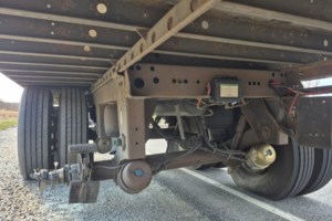 Commercial driver charged after wheels fly off truck on Highway 11