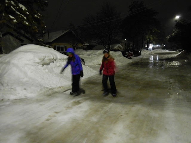 Carmela and Charlize Baker skate up Beth Ave. after freezing rain fell on the city. Supplied.
