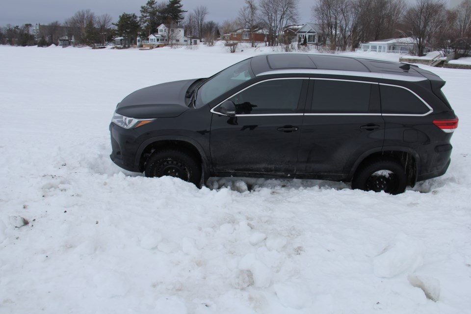This SUV is stuck in the ice on Lake Nipissing at the end of Marshall Ave. today. Jeff Turl/BayToday.