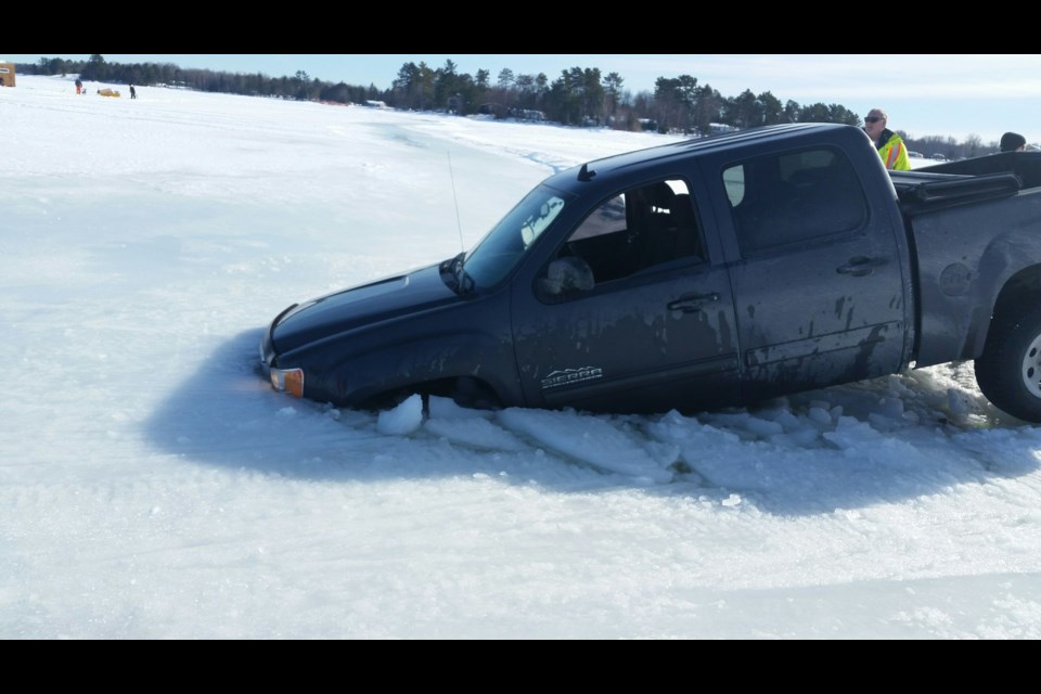 This truck is partially submerged after driving near a pressure crack at Deep Water Point on Lake Nipissing.  Photo submitted.  
