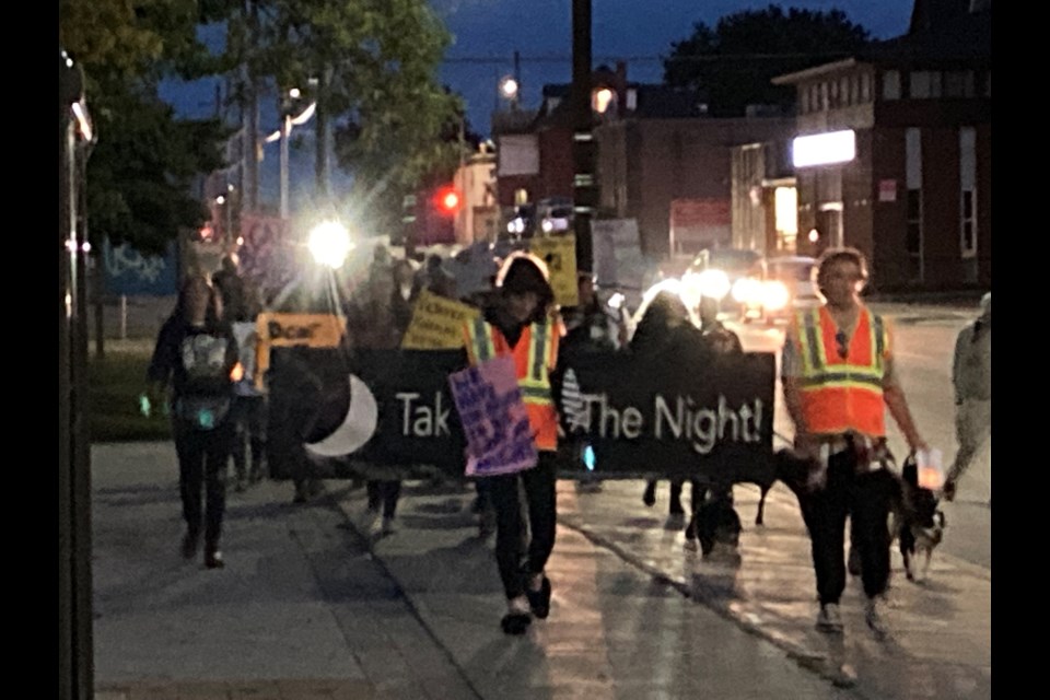 Men, women and children marched in the Take Back the Night family friendly march