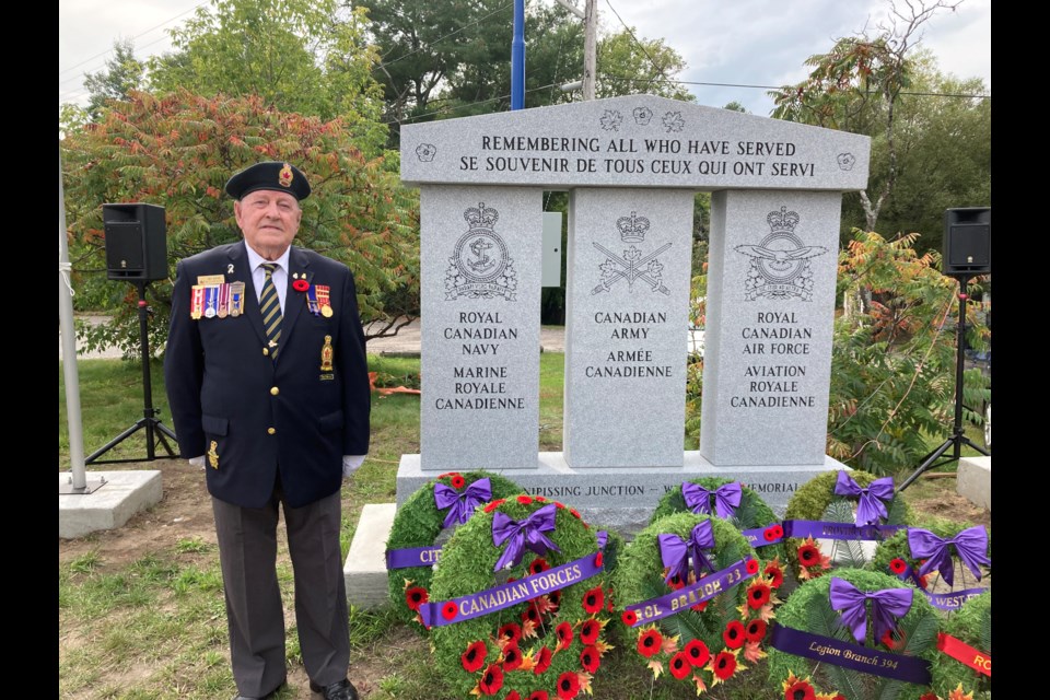 CWO retired Len Davis stands beside the outcome of five years of hard work to make this cenotaph/monument a dream for Royal Canadian Legion West Ferris Branch 599 