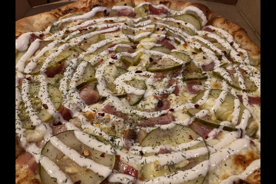 A new taste in pizzas "spicy bacon dill" served at the Greco's Pizza Presto.. 