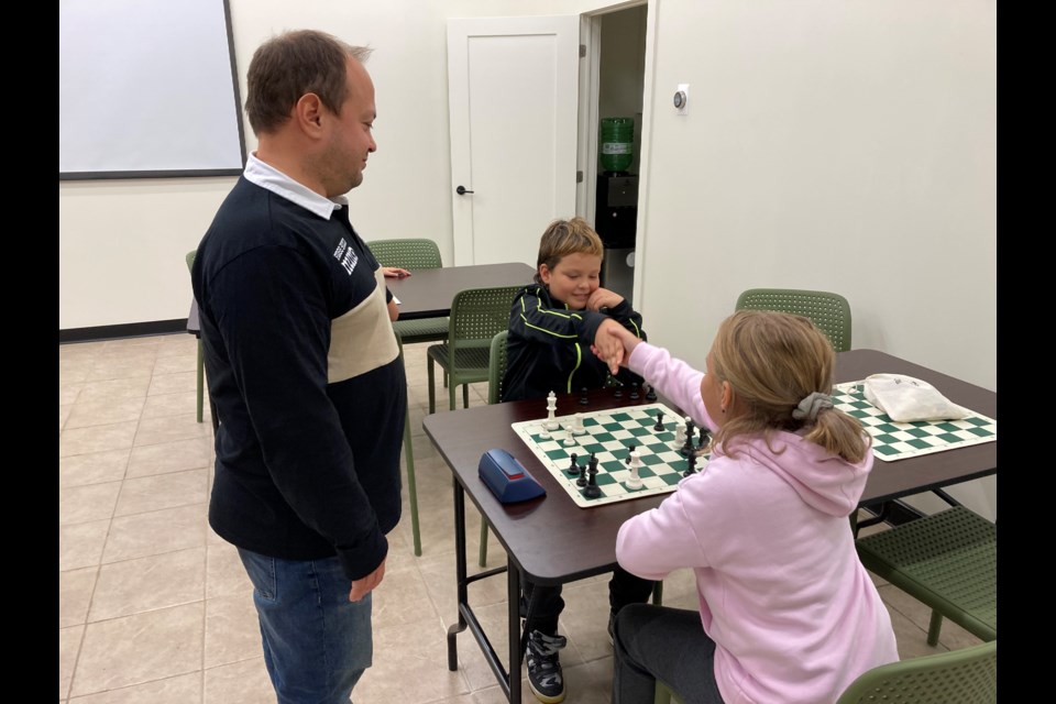 Checkmate! 
Markus and Zoe end their game under the watchful eye of the chess teacher Dmytro Korotkykh 