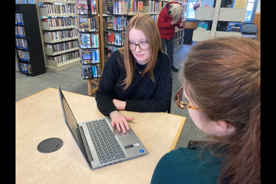 Carly Paul, library clerk and technology trainer offers tech lessons at the Callander Public Library.
