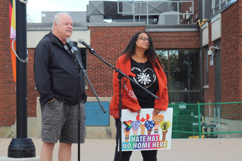 Jason Maclennan and Jocelyn Green  address the crowd before the flag raising   / Photo David Briggs