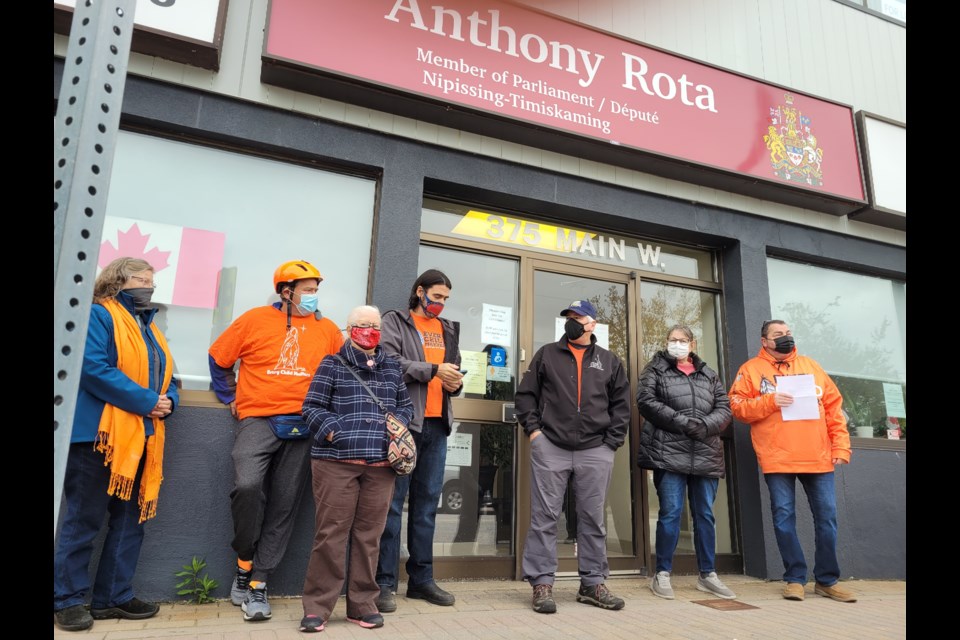 Members of North Bay and District  Labour Council met outside MP Rota's office this afternoon to pressure government to enact Truth and Reconcilliation recommendations / Photo David Briggs 