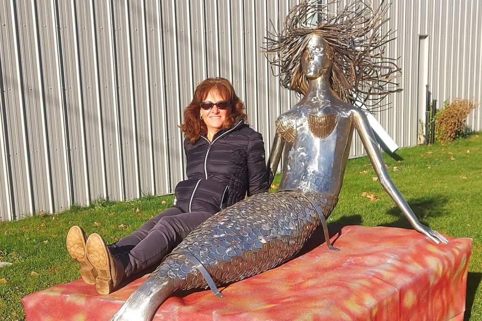 The founder of the Sturgeon Falls Beautification Group, Gayle Primeau, poses with Marina / Photo supplied