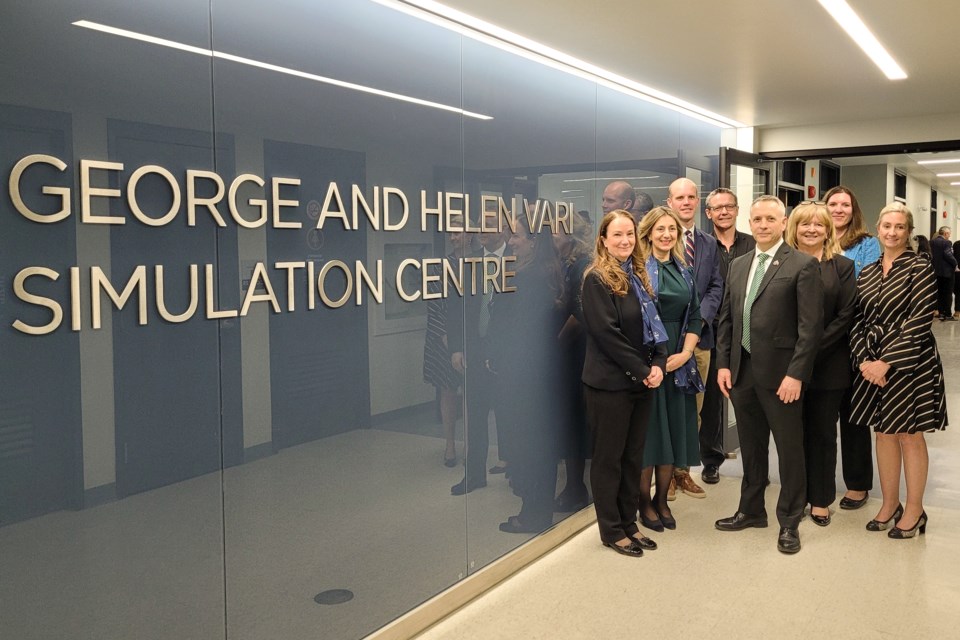 It was a big day at Nipissing University with the official opening of the George and Helen Vari Simulation Centre. Left to right: Agnes Hilkene and Victoria De Luca (George and Helen Vari Foundation); Dr. Graydon Raymer (Interim Dean of Education and Professional Studies); David Smits (Chair, Nipissing University Board of Governors); Dr. Kevin Wamsley, (President and Vice-Chancellor, Nipissing University); Cheryl Sutton (Vice-President, Finance and Administration), Renée Haquard (Assistant Vice-President, Finance and Infrastructure); Dr. Karey McCullough (Interim Associate Dean, School of Nursing).