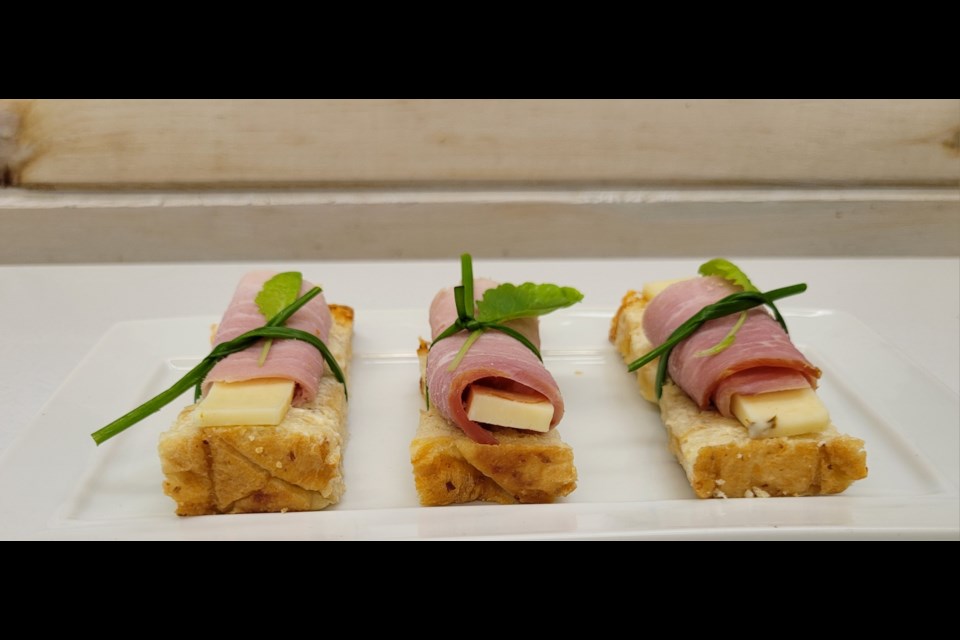 Ham and cheese tea sandwiches on house-made sourdough cheese bread by Savoir Faire Catering