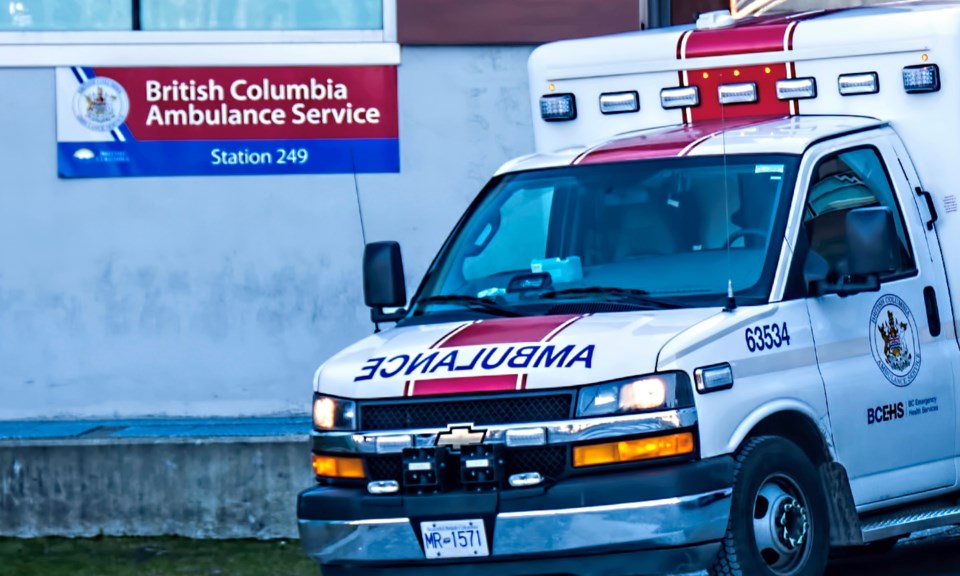 Ambulance with sign - cc