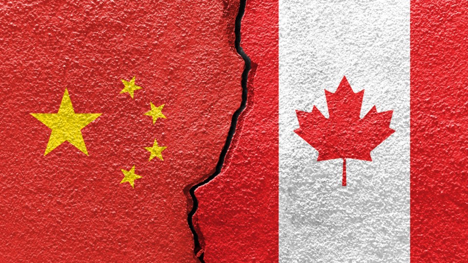 Canada-China-flag-crack-web-Pitiphothivichit-iStock-Getty Images Plus