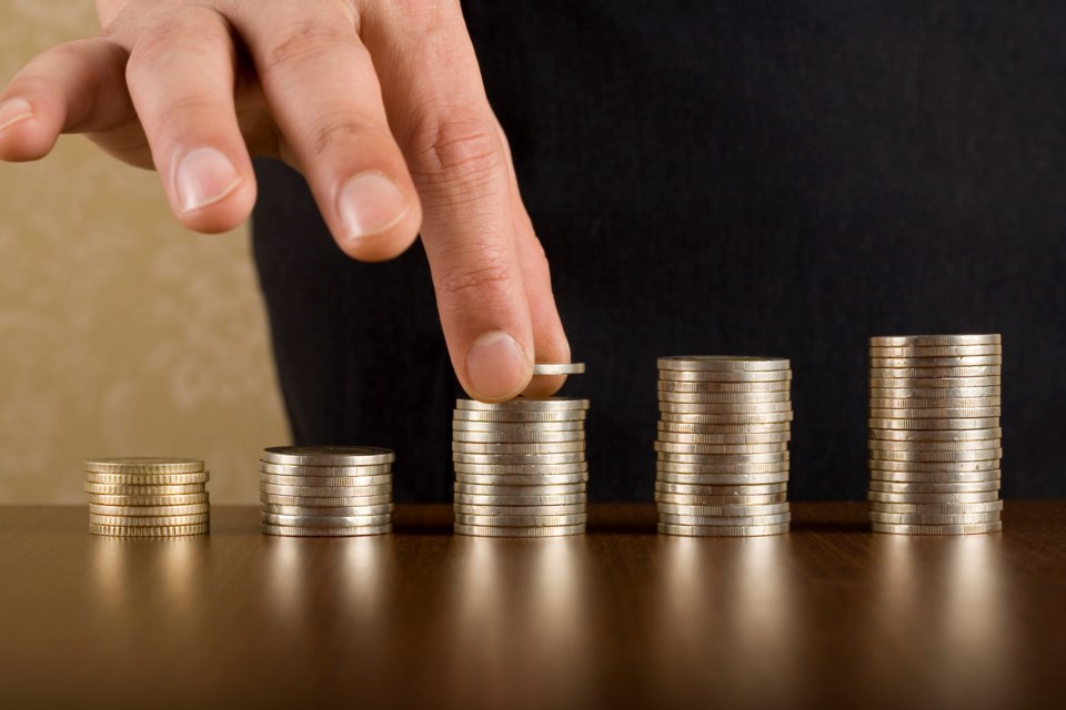 counting-coins-money-kutaytanir-eplussymbol-getty-images