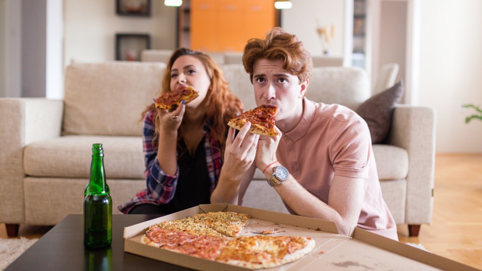 Eating-in-front-of-TV-web-FluxFactory-Eplus-Getty Images